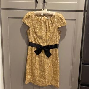 Gold sequin cap sleeve w/ black satin bow